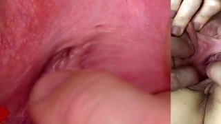 The mistress's cunt is stretched. Extreme close-up of her wide open pussy. POV