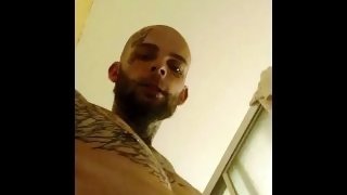 Sexy man with tattoos jacking his cock in the shower