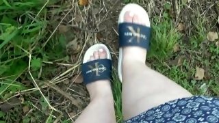 I walk in slippers in the forest. POV.