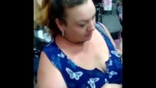 BBW milf flashing tits in a clothing store