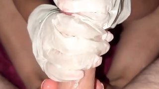 Latina handjob with rubber gloves and ice