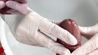 Medical water features - Patient POV - white latex gloves glans handjob