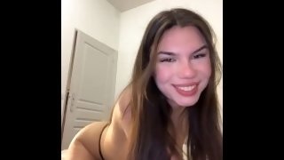 Cute teen in red underwear slapping her butt