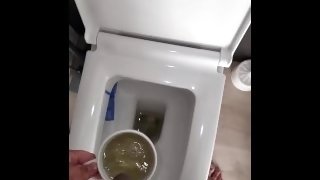 Pissing in cup