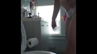 Pissing in the toliet.