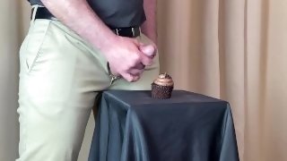 Huge cumshot on a delicious chocolate cupcake