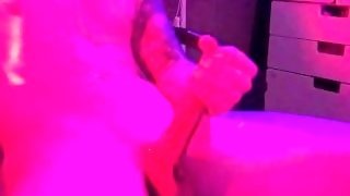 Man moans and jerking off hard cock on neon light