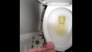 Huge average dick pissing in toilet shaking cock off