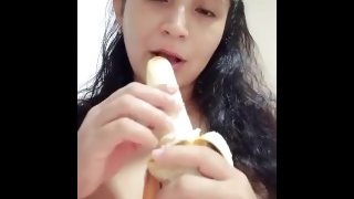 big tit latina girl sucks a huge banana