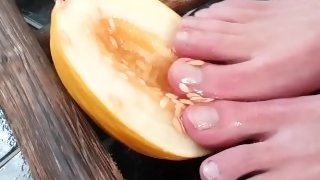 This is for the girls ) Fingernig a honeydew melon like a pussy with my feet