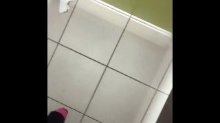 Stripping completely naked in public toilet