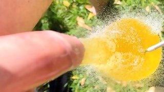 Popping a piss filled condom 4K