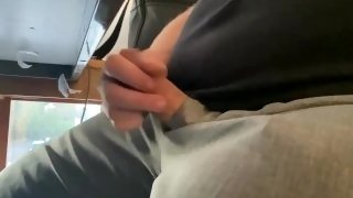 Boss plays with his cock under the desk