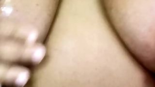 Rubbing my big tits