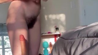 Rubbing my hairy pussy and lubing up my realistic dildo