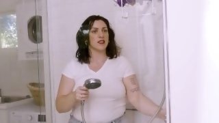Hot busty MILF masturbates in the shower