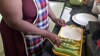 Bengali Indian maid playing with vegetable