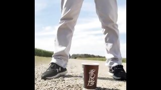 Windy Outdoor Stream Pissing in a McDonald's Cup