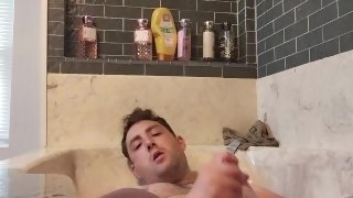 Jerking off in jetted tub