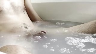skinny dude with a massive dick beating off in the bath