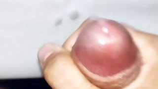 Close up cock jerking off and cumshot