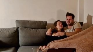 A couple in love watches porn on the couch to start the fire +conversation +(dirty) talk