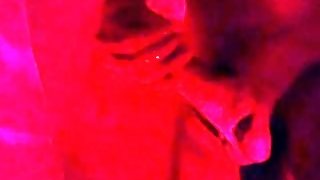 Sexy long haired guy jacks his big dick off slowly and male moans in sensual red mood light
