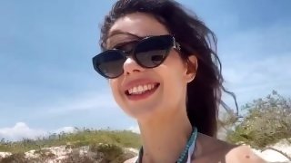 Hot girl with big tits masturbate on a public beach with anal plug until squirt
