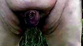 Flaccid Cock pissing outside naked.